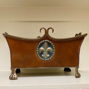 Decorative metal fleur-de-lis planter/container.